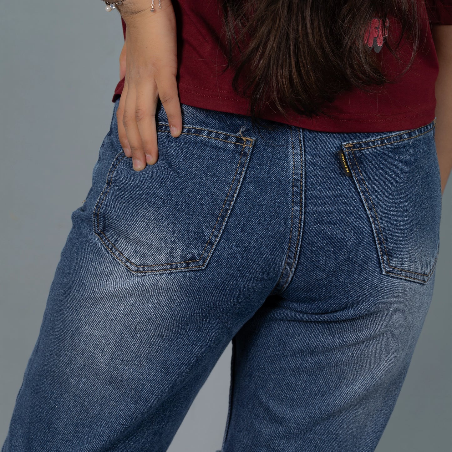 Highwaist Whiskers Distressed Mom Fit Denim In Mid Blue