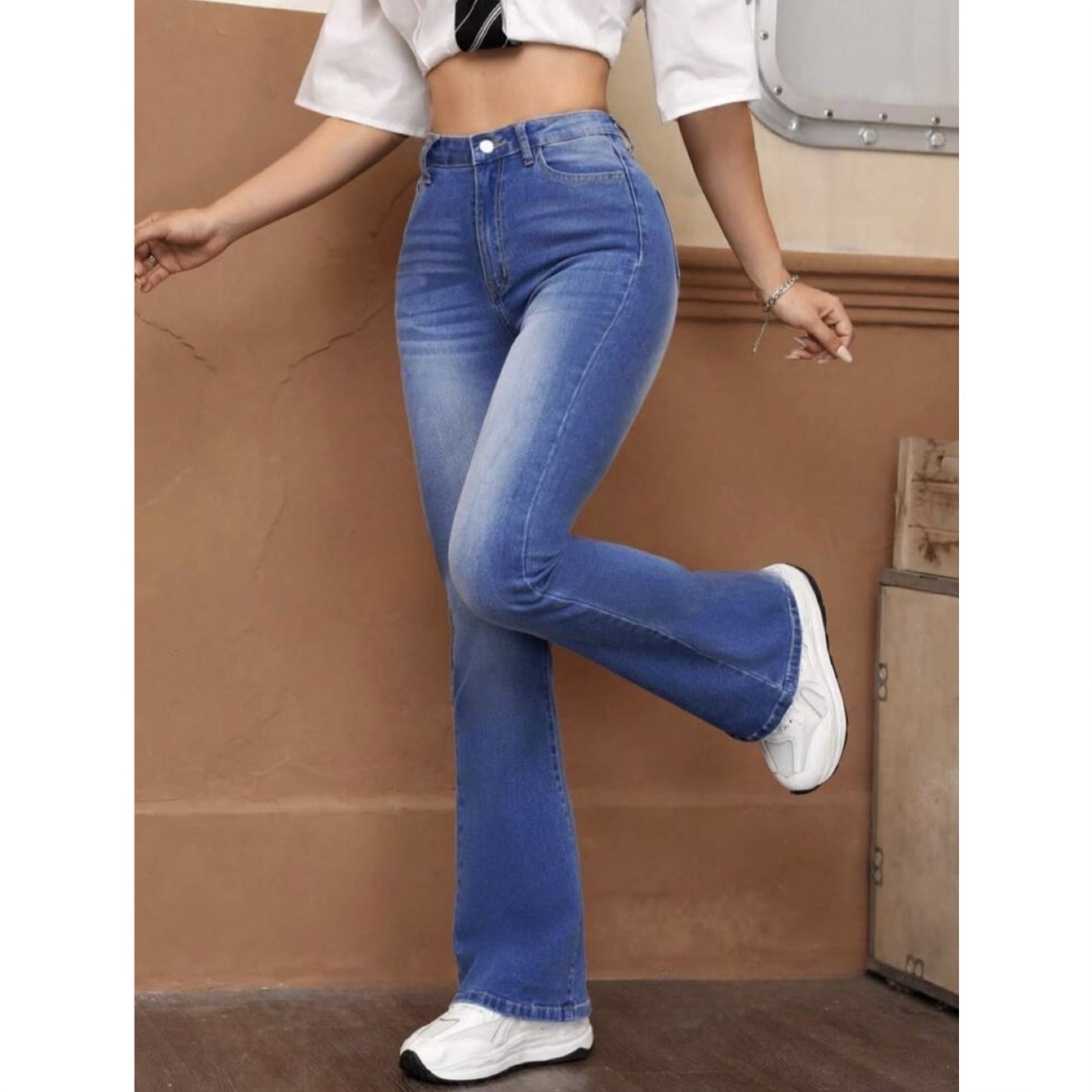 Highwaist Whisker Wash Bellbottom Flared Leg Denim In Medium Wash