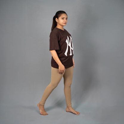 Side profile of beige colour mesh yoga pants for women -  Glamulous Clothing
