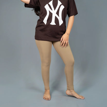 Mid-rise relaxed beige colour workout leggings pants for women - Glamulous Clothing
